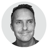 Ricky Butler black and white headshot inside circle