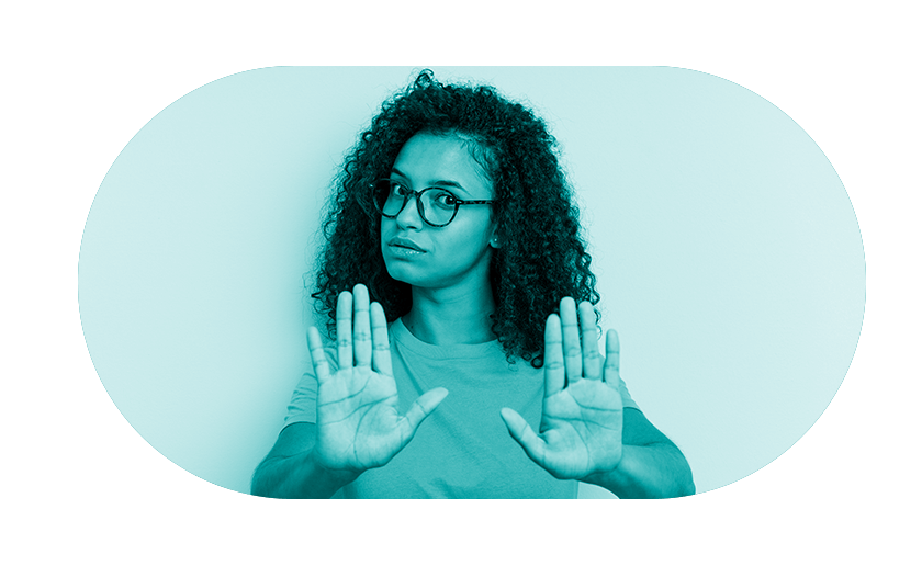 Man sitting with head in hands next to piggy bank with teal overlay