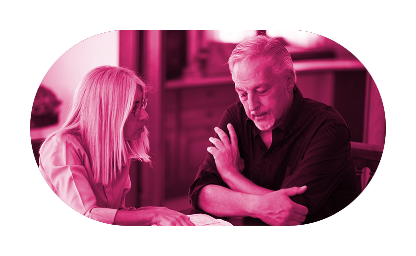 Woman and man checking cost of bills on pink overlay