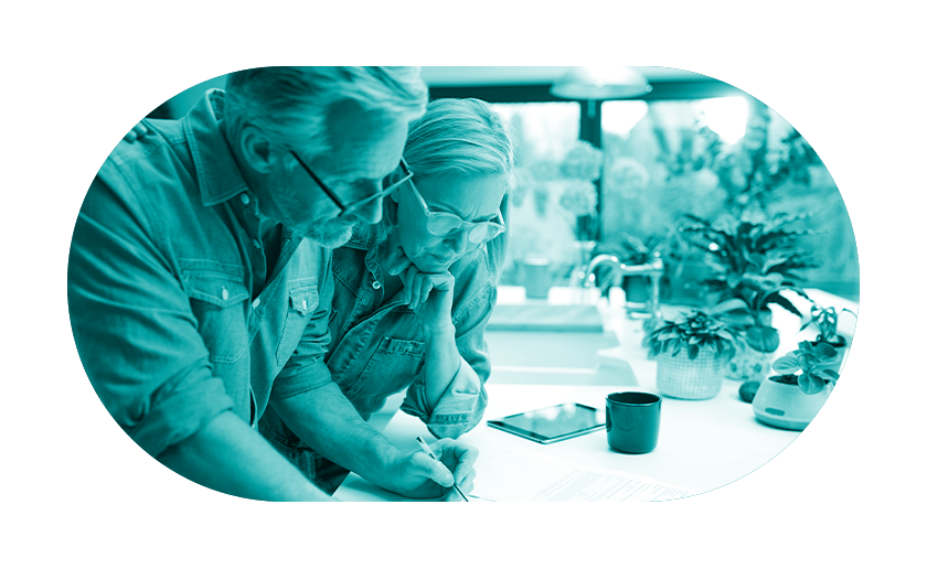 Man and woman looking at paperwork